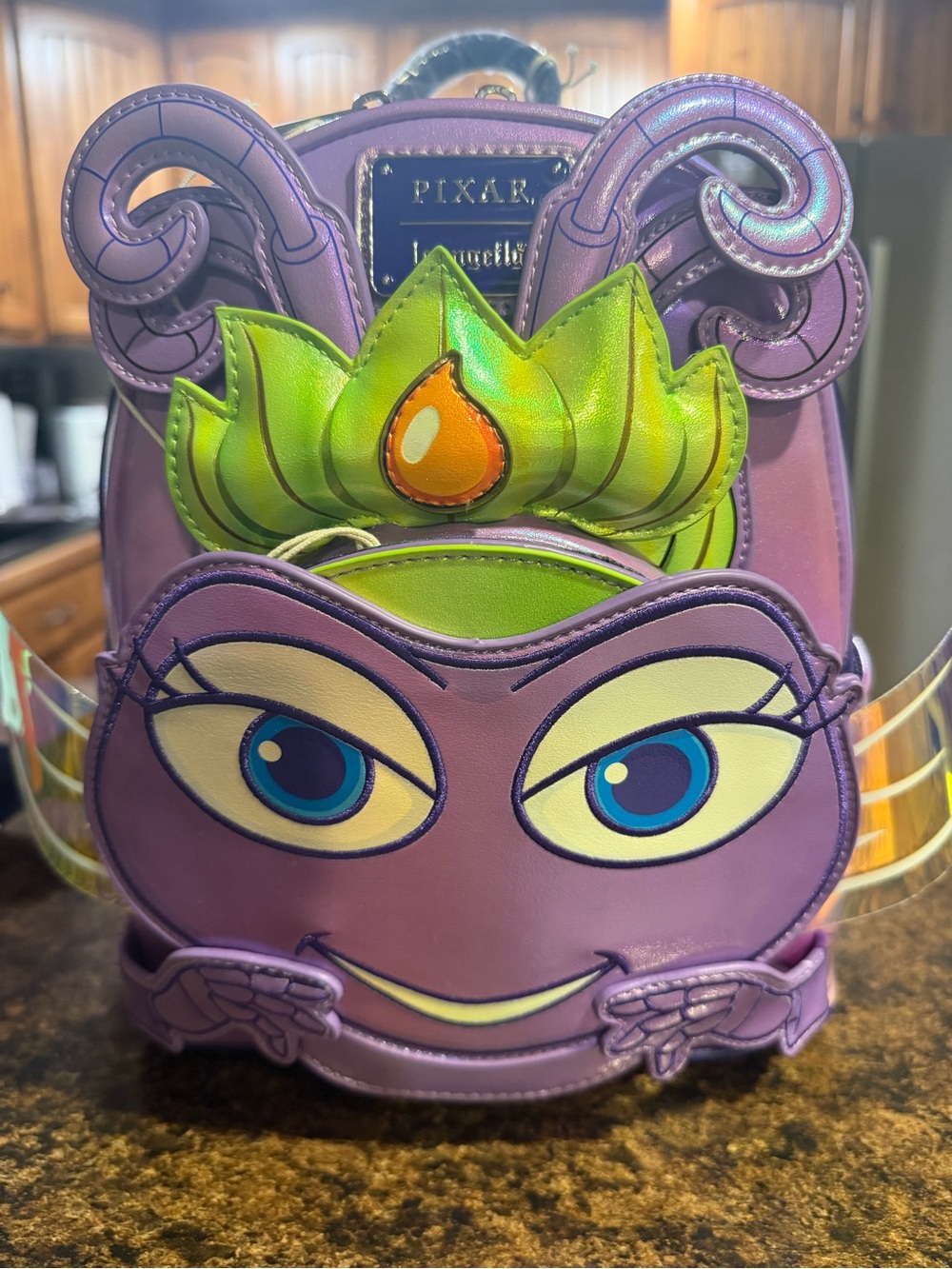 Loungefly Purple & Green Kids Character Mini Backpack with Blue Eye Details - Picture 1 of 4